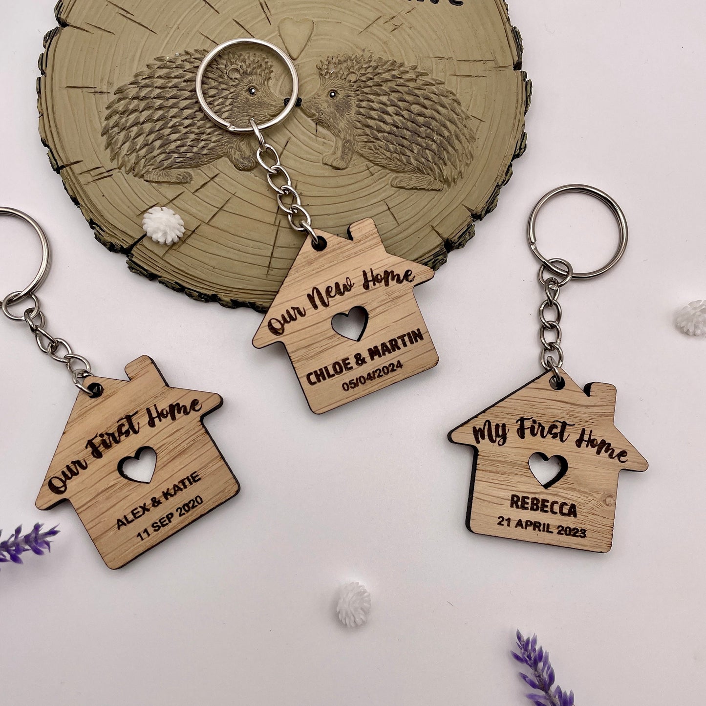 A beautiful pair of handmade oak veneer keyrings in the shape of a cute little house. They make a lovely moving in gift for your partner, friend or family member who has recently purchased their first home.