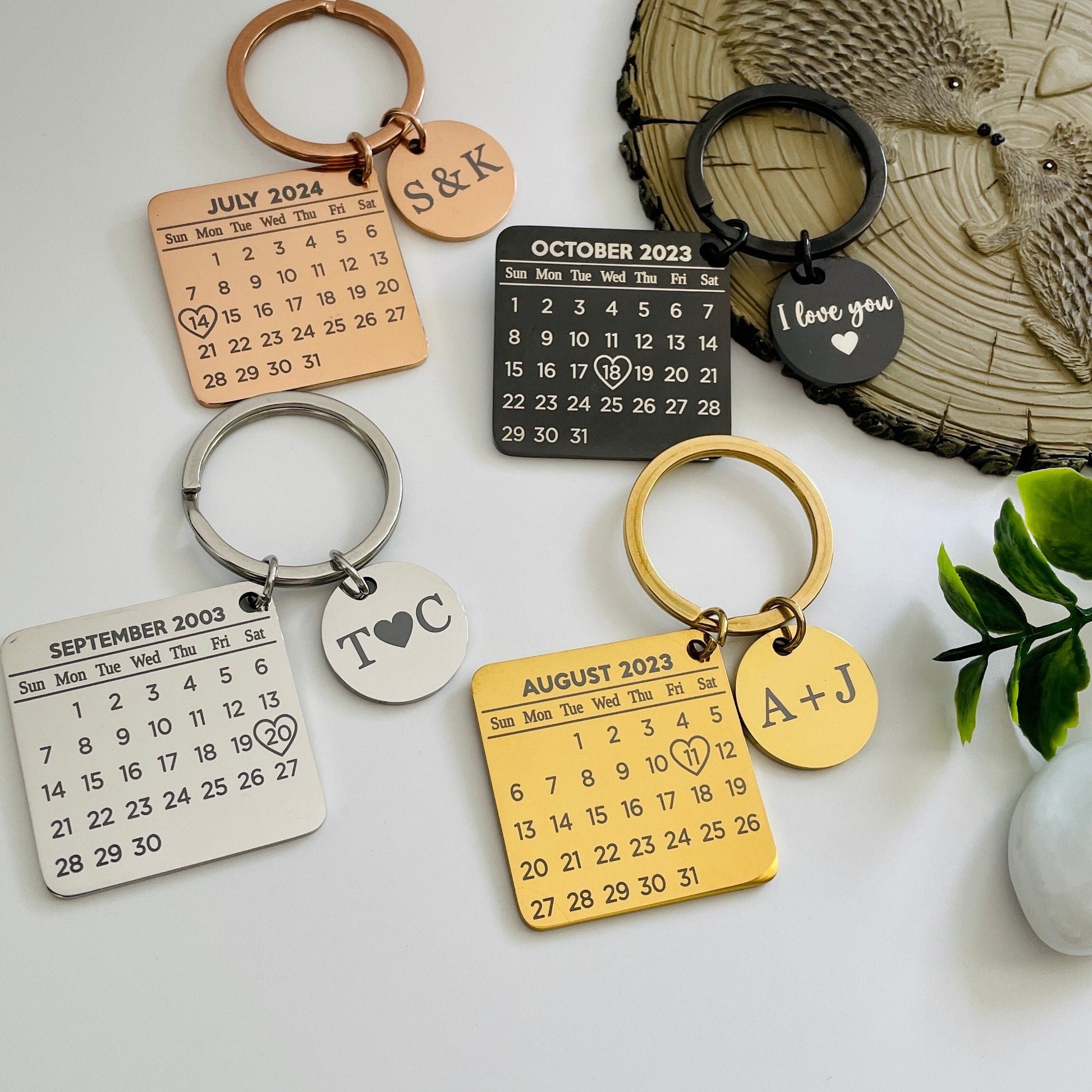 Capture the elegance and craftsmanship of our Personalised Calendar Keychain in this striking image. Highlight the sleek stainless steel design and the custom engraved date and initials, showcasing its durability and personalisation options.