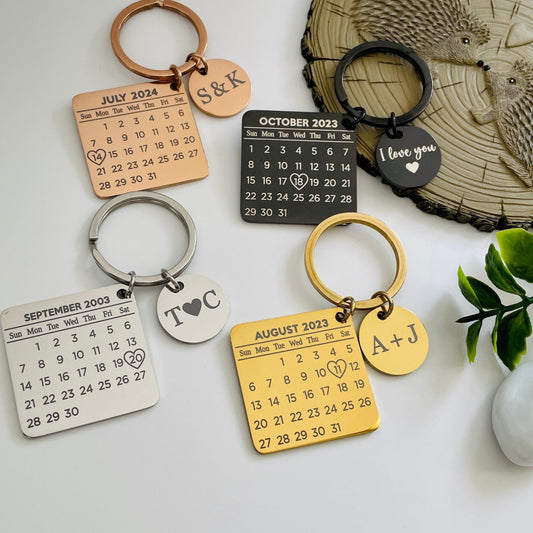 Capture the elegance and craftsmanship of our Personalised Calendar Keychain in this striking image. Highlight the sleek stainless steel design and the custom engraved date and initials, showcasing its durability and personalisation options.